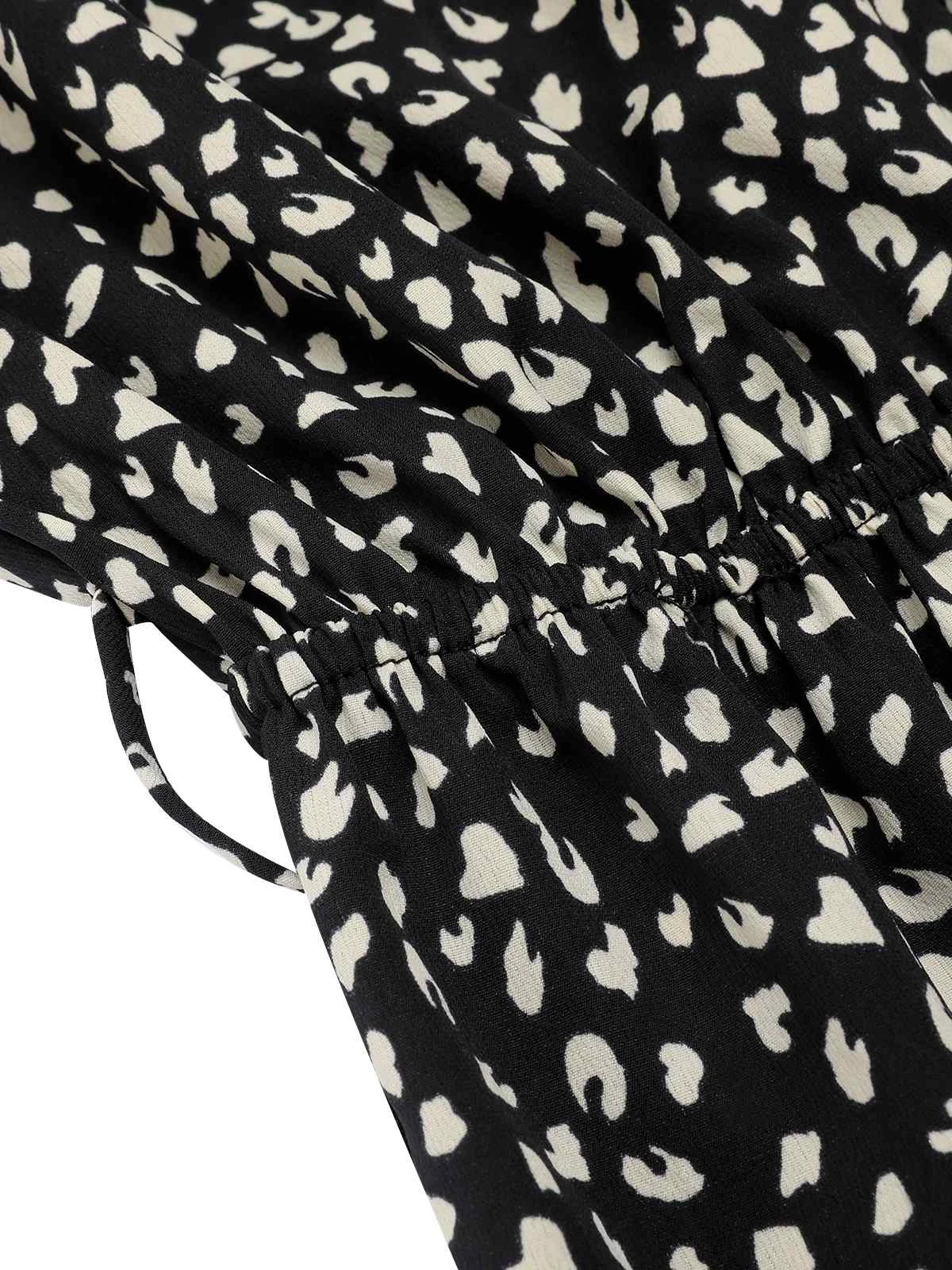 Black 1950s Printed V-Neck Belted Romper 7 Black 1950s Printed V-Neck Belted Romper - Image 5